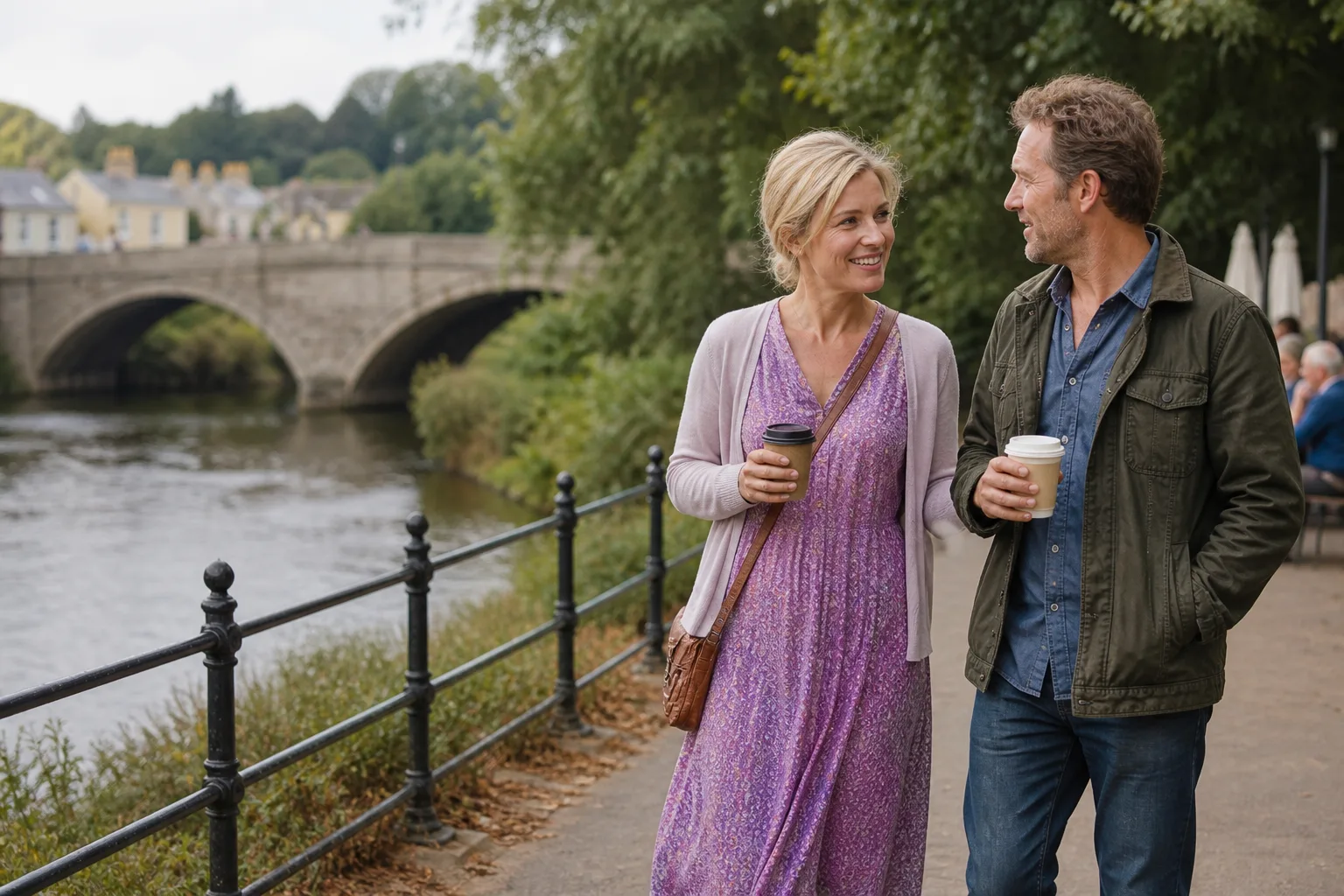 Two people talking over coffee at an independent café in Somerset